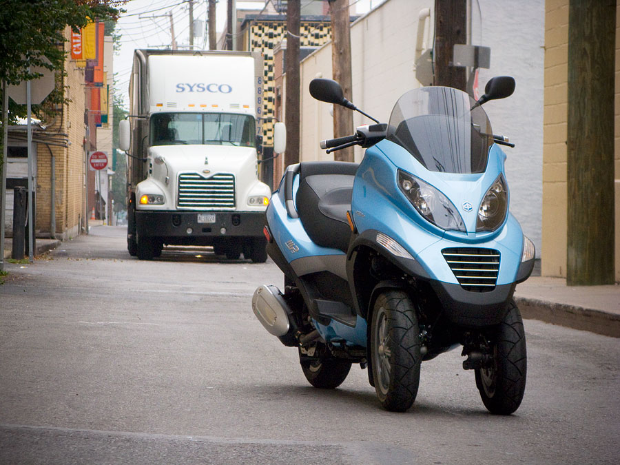 Piaggio MP3 250 scooter in an alley