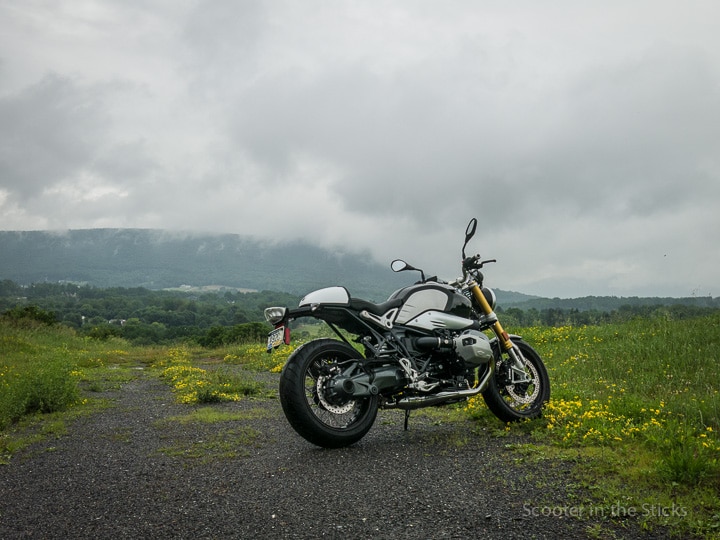BMW R nineT motorcycle and Mt. Nittany in fog