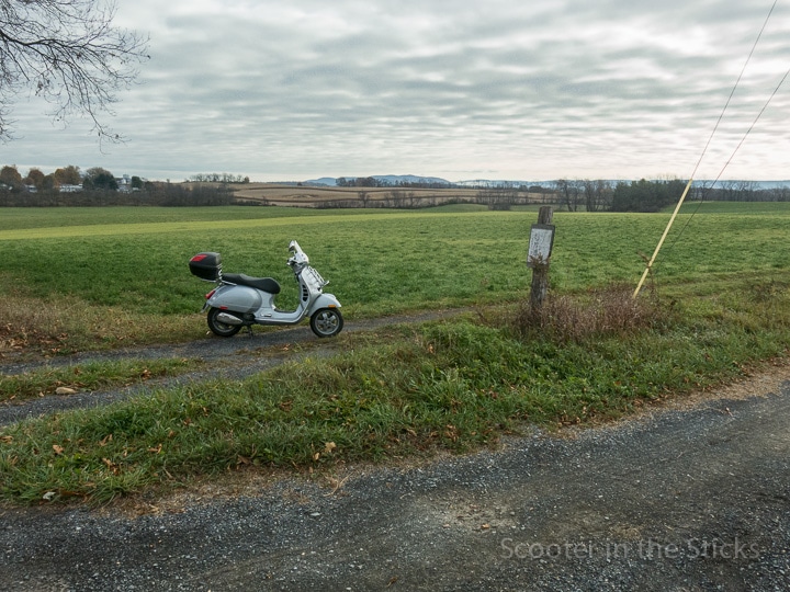 Vespa GTS scooter in farm field