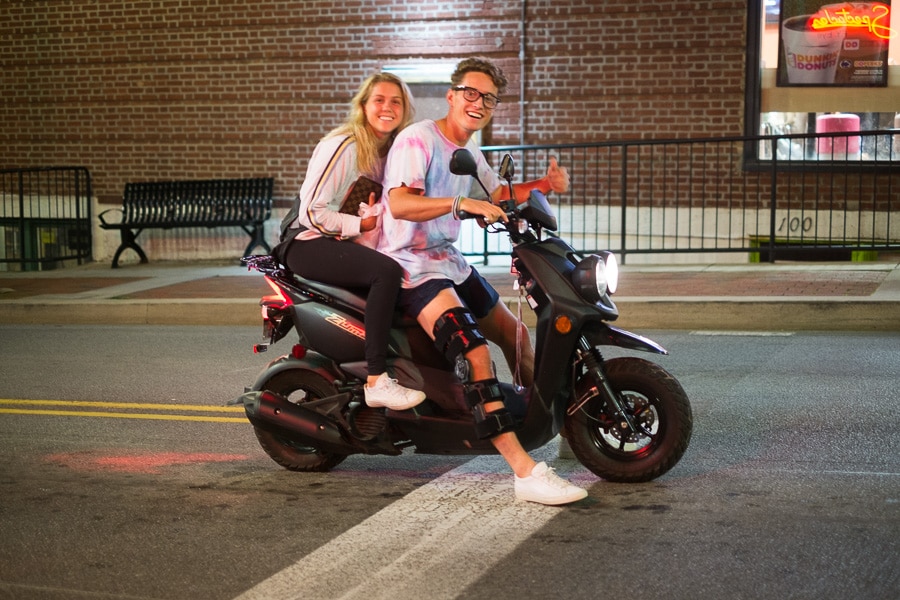 Young couple on scooter