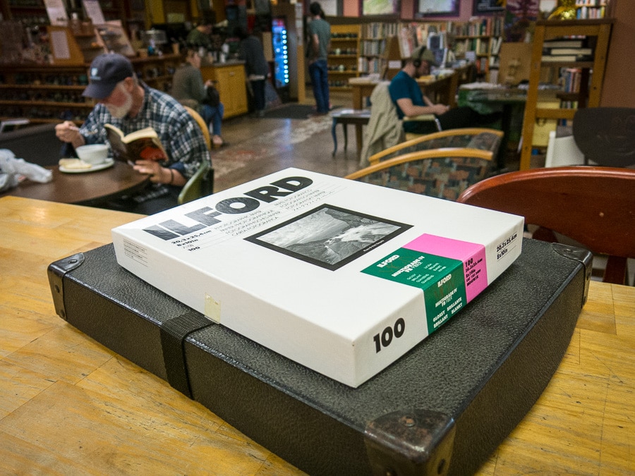 A box of black and white photographs