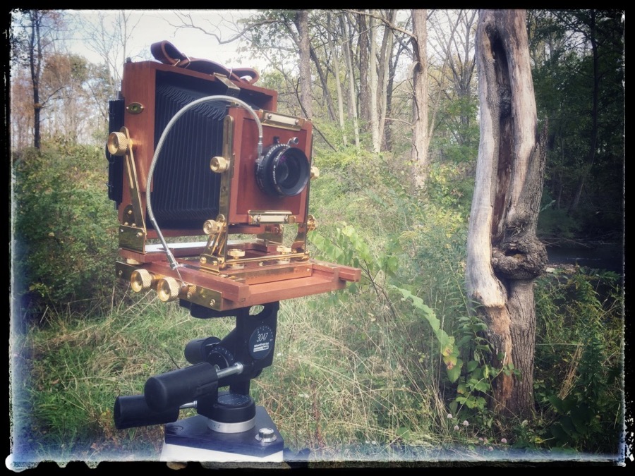 4x5 Zone VI view camera on tripod in woods