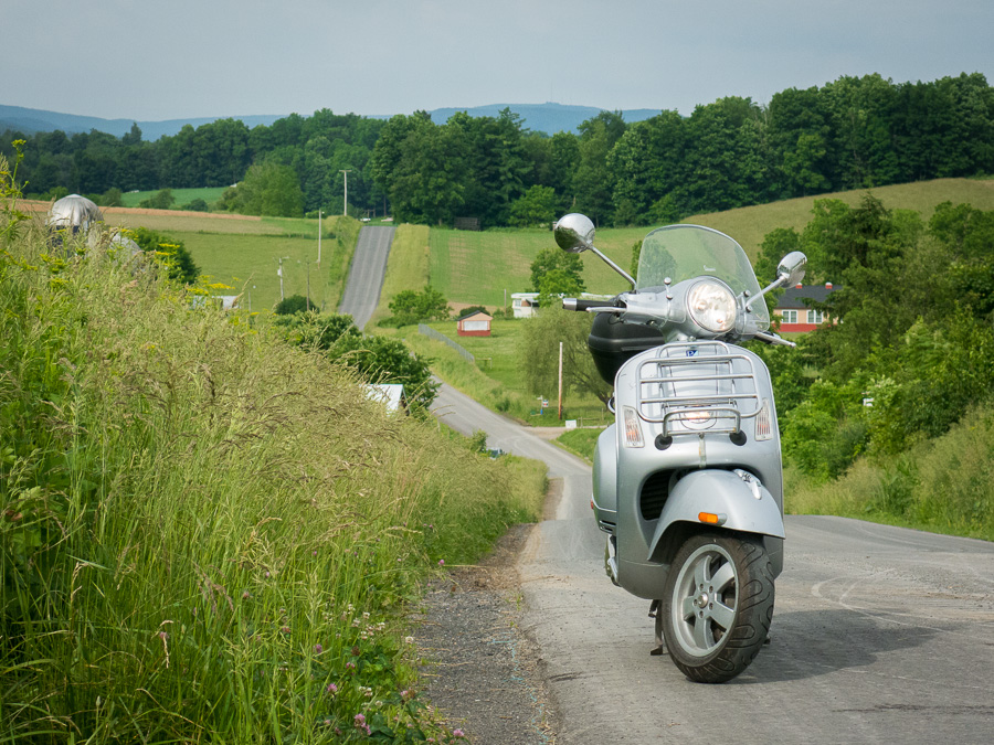 Vespa GTS scooter on a rural road in Penns Valley.