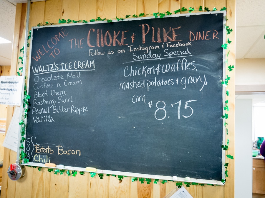 Menu items on the Choke and Puke Diner board.