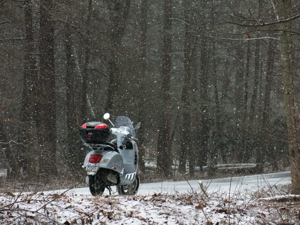 Vespa GTS scooter in the snow