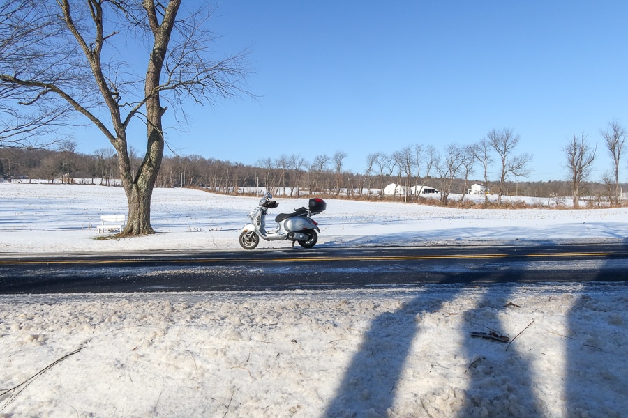Vespa GTS scooter in the winter landscape