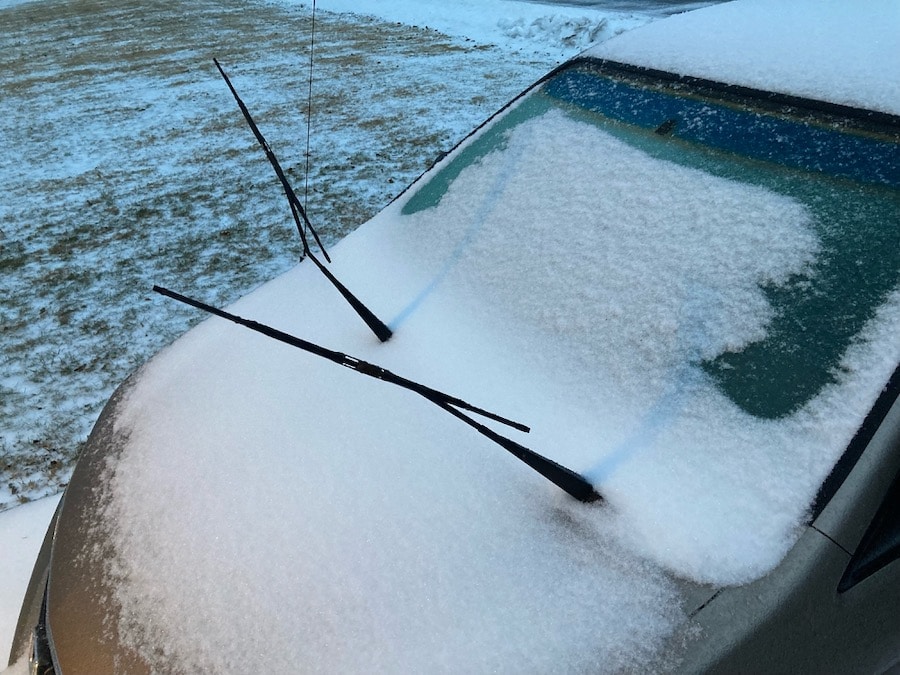 Snow and ice on car windshield.