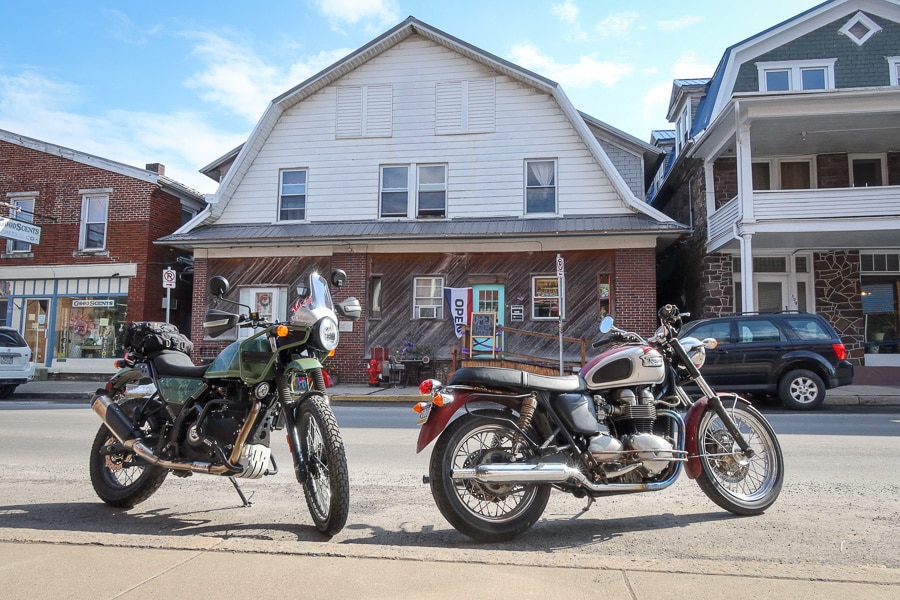 Two motorcycles parked on the street in Millheim, Pennsylvania