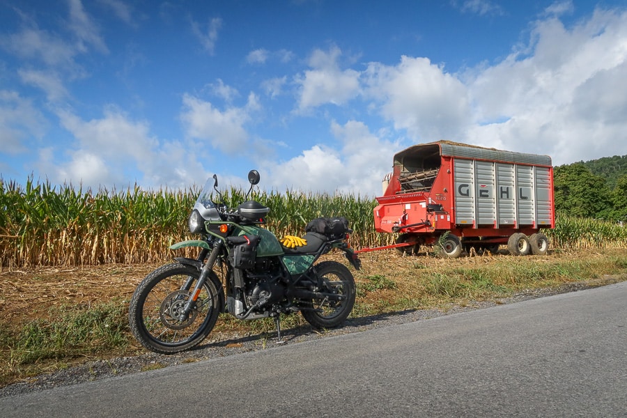2022 Royal Enfield Himalayan parked by a cornfield.
