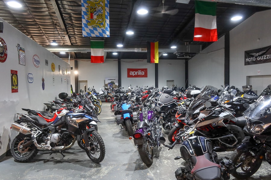 Showroom full of used motorcycles.