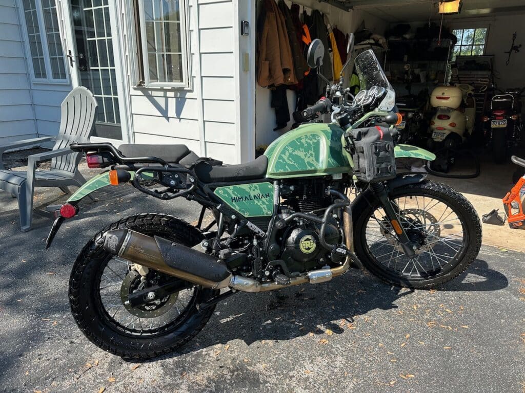 A wet, freshly washed Royal Enfield Himalayan.