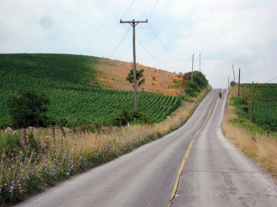 Rural road through farmlands.