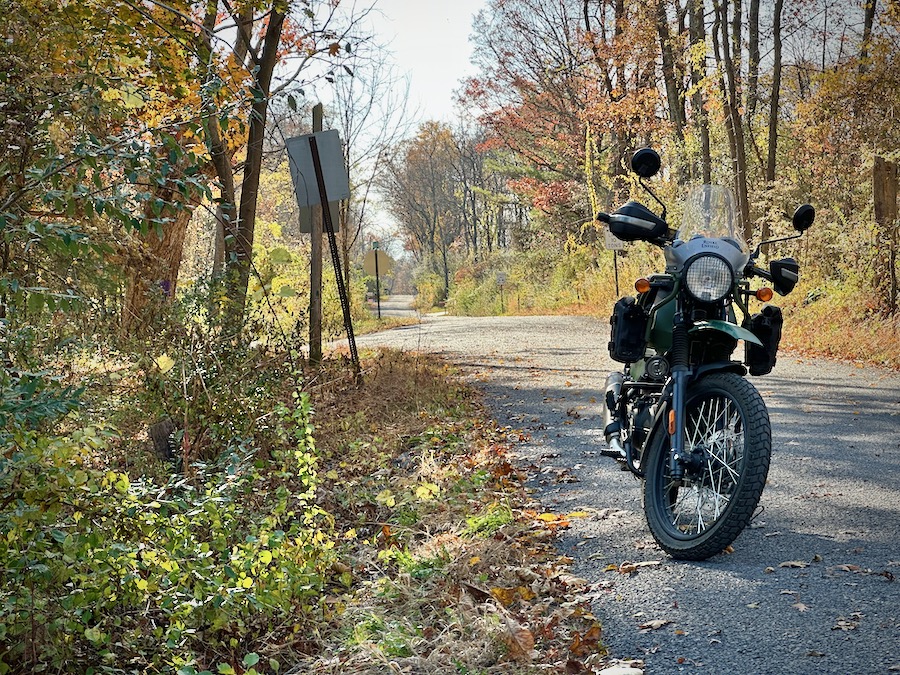 Royal Enfield Himalayan motorcycle on a rural road.