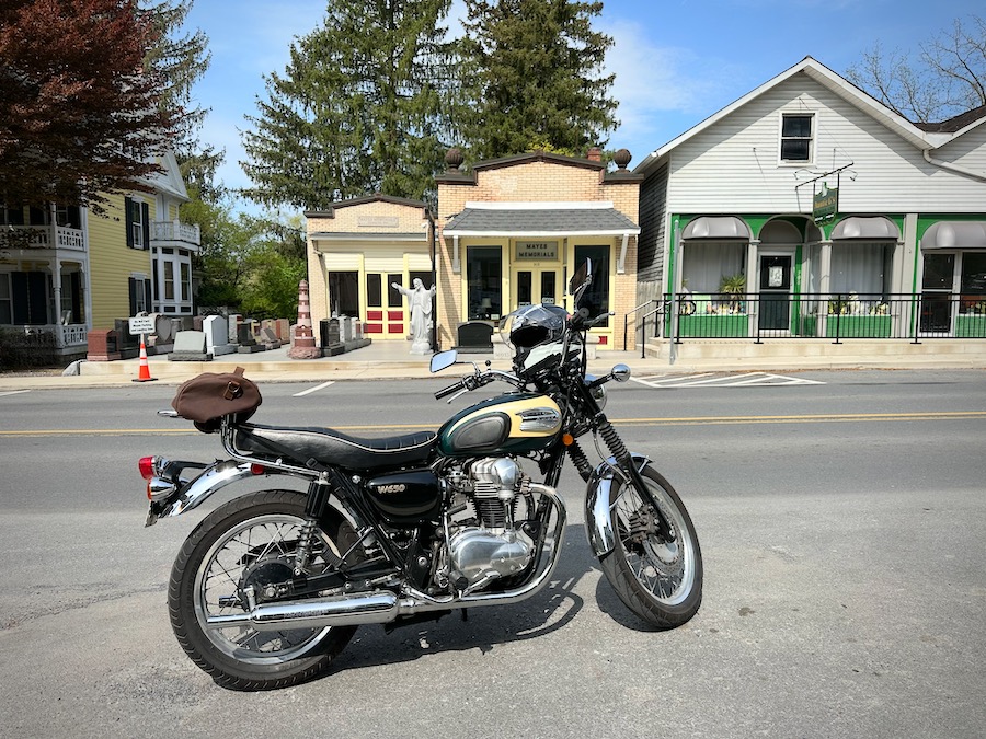 2001 Kawasaki W650 parked along a street.