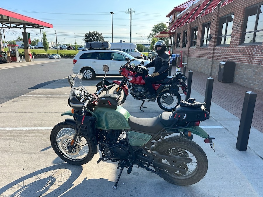 Two motorcycles parked outside a Sheetz convenience store.