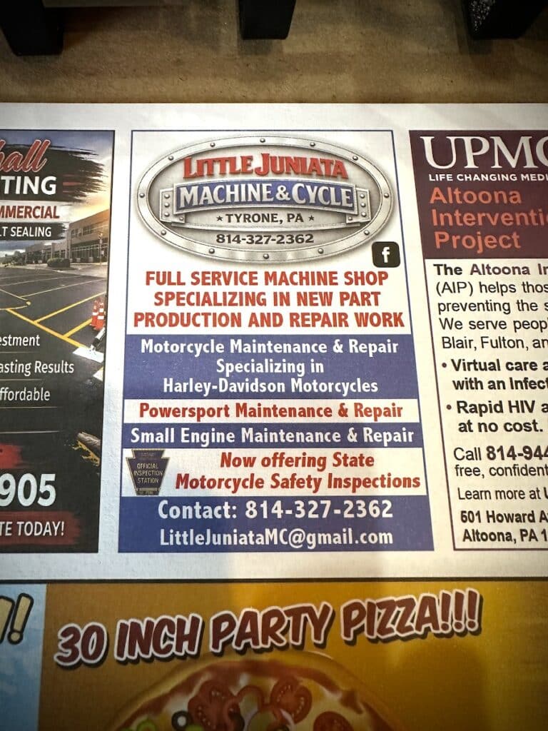 An ad for Tyrone Machine and Cycle on a placemat.