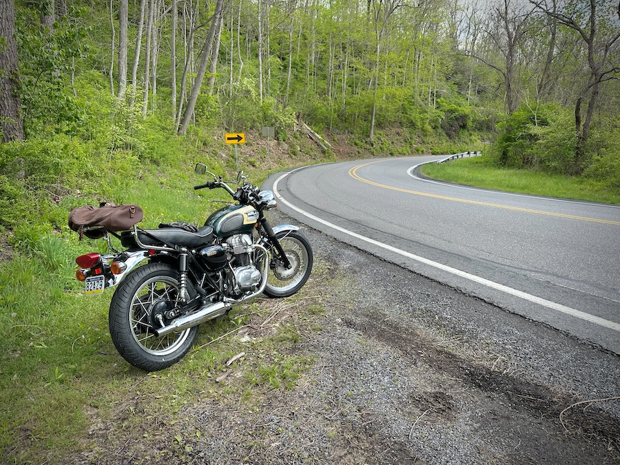 2001 Kawasaki W650 along a rural road.