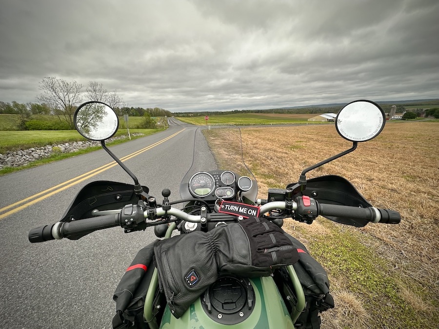 Looking over the handlebars of the Royal Enfield Himalayan motorcycle.