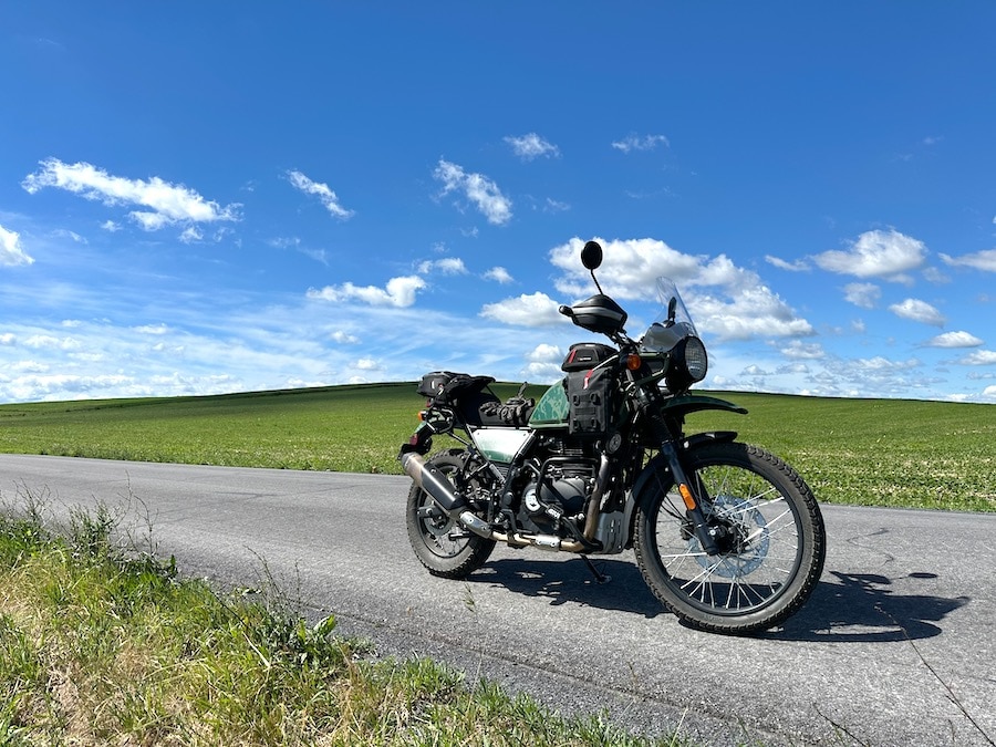 2022 Royal Enfield Himalayan motorcycle on a rural road.