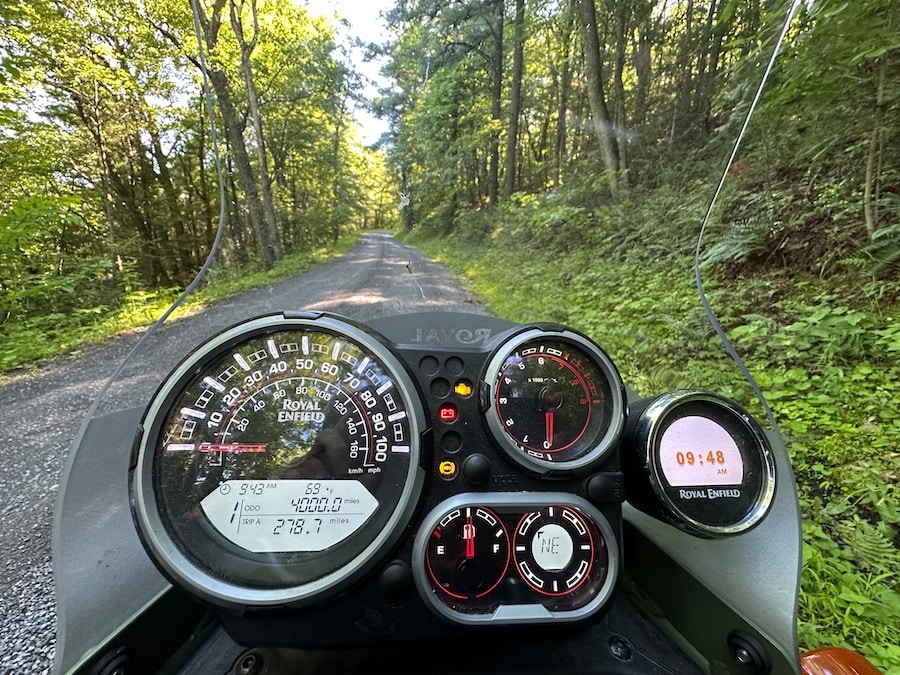 The instrument cluster on a Royal Enfield Himalayan with the odometer showing 4000 miles.