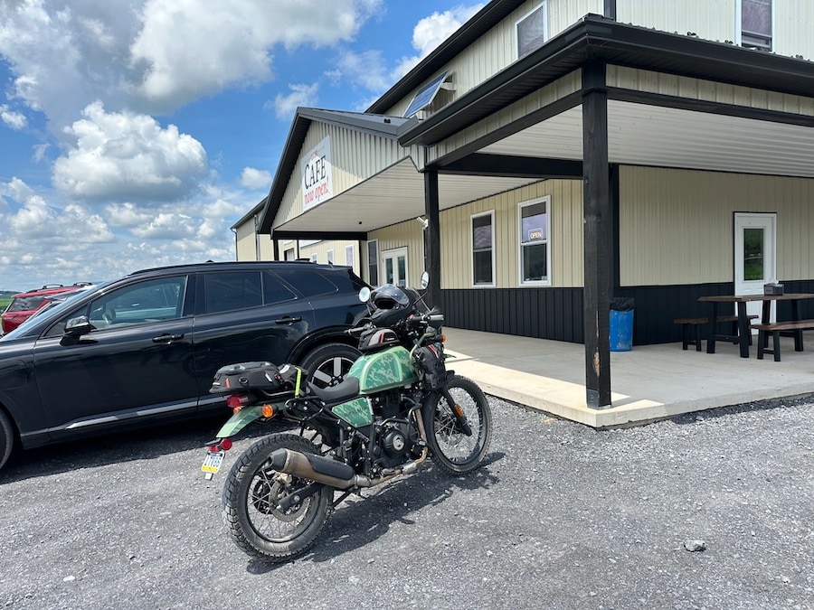 A 2022 Royal Enfield Himalayan parked at an Amish restaurant.