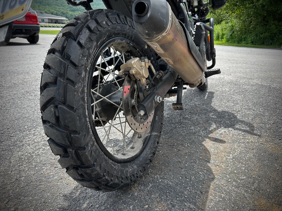 The rear tire on a 2022 Royal Enfield Himalayan.