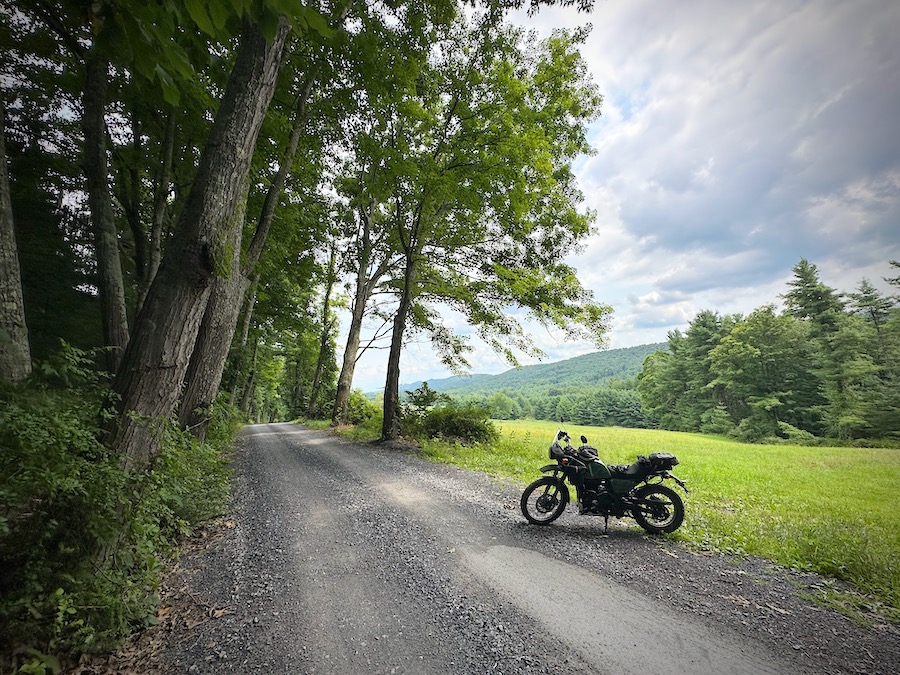 A 2022 Royal Enfield Himalayan motorcycle along a rural road.