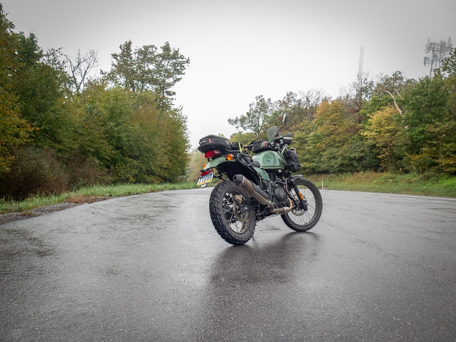 A Royal Enfield Himalayan on a wet morning.