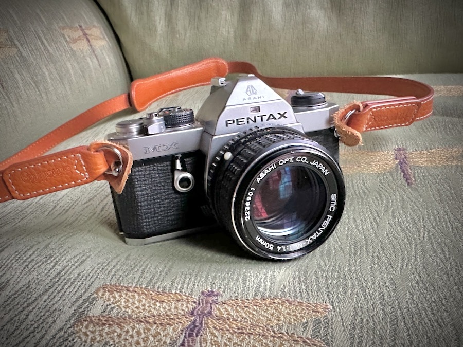 A Pentax MX SLR camera.